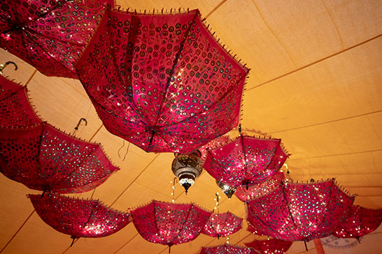 Upside-down umbrella installation at a 21st birthday party in Devon