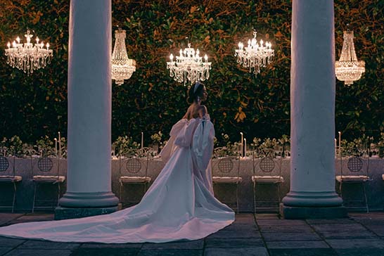 Chandeliers hanging outside with use of chandelier stands