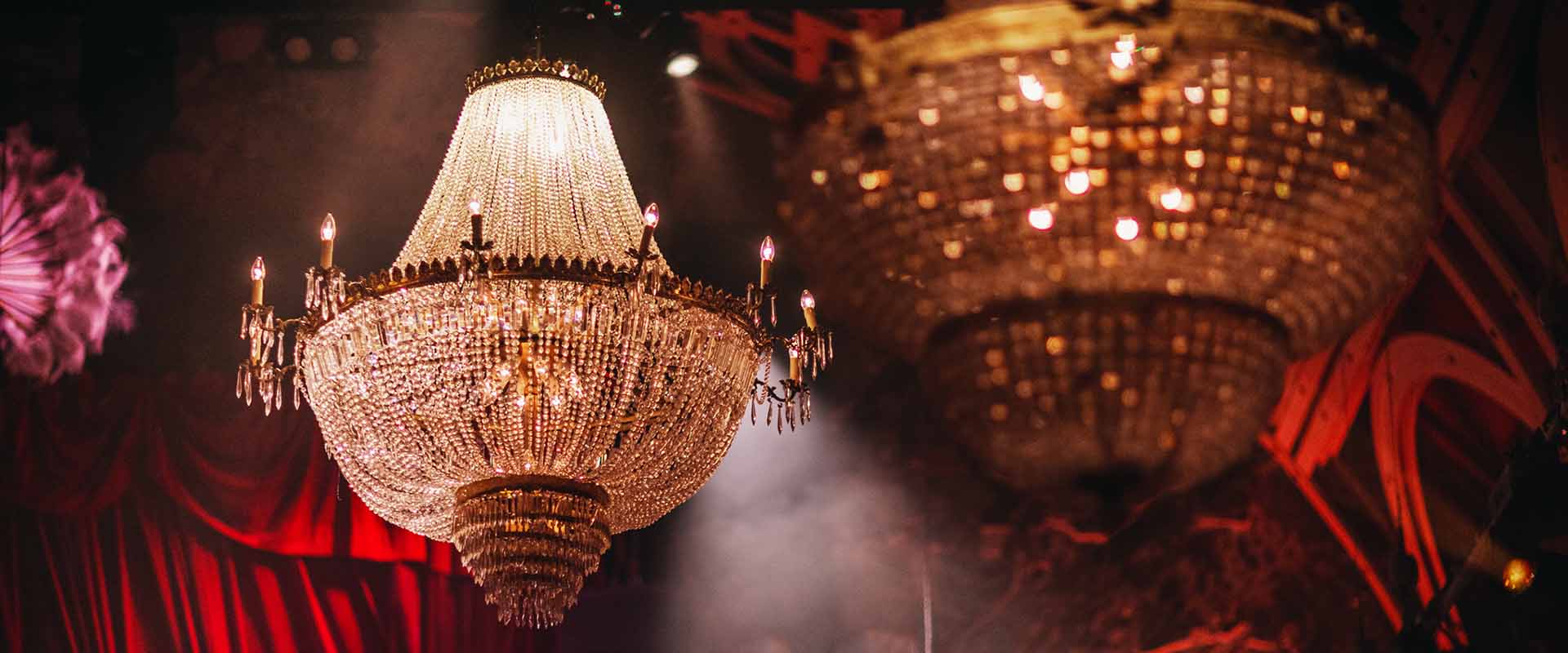 Crystal Empire Necklace chandelier at private event in London with red drape ceiling