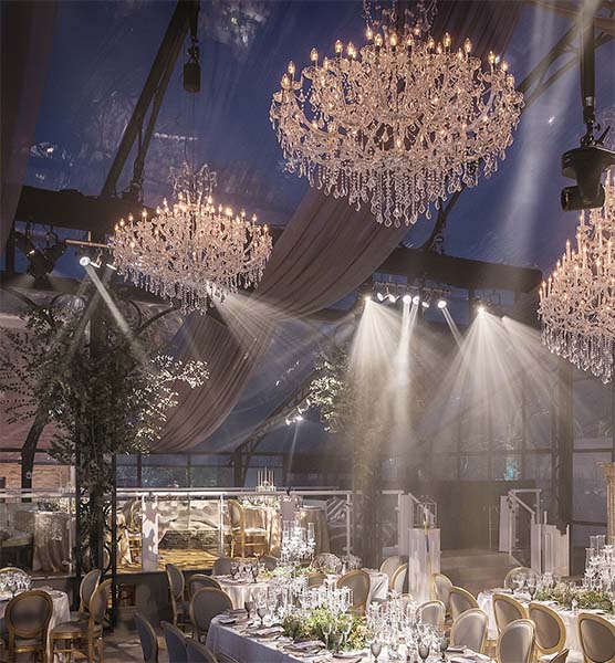 Marie Therese 150 chandeliers in glass marquee for wedding party