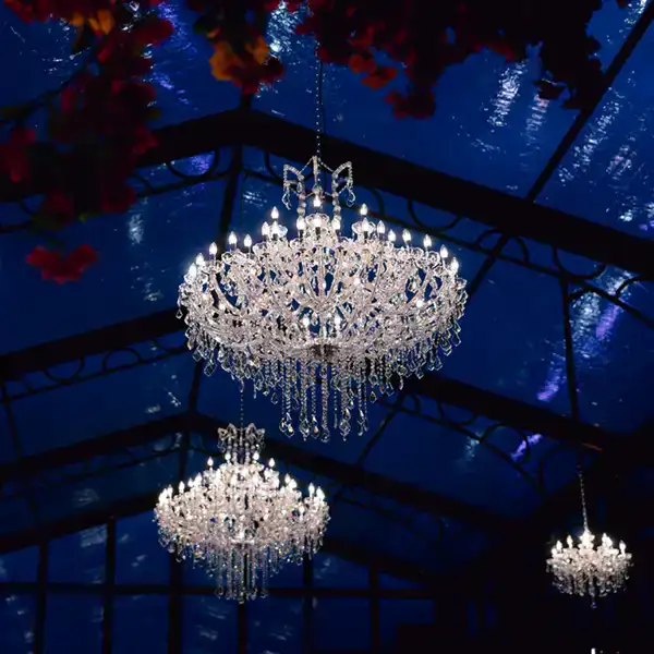Marie Therese chandeliers in glasshouse marquee